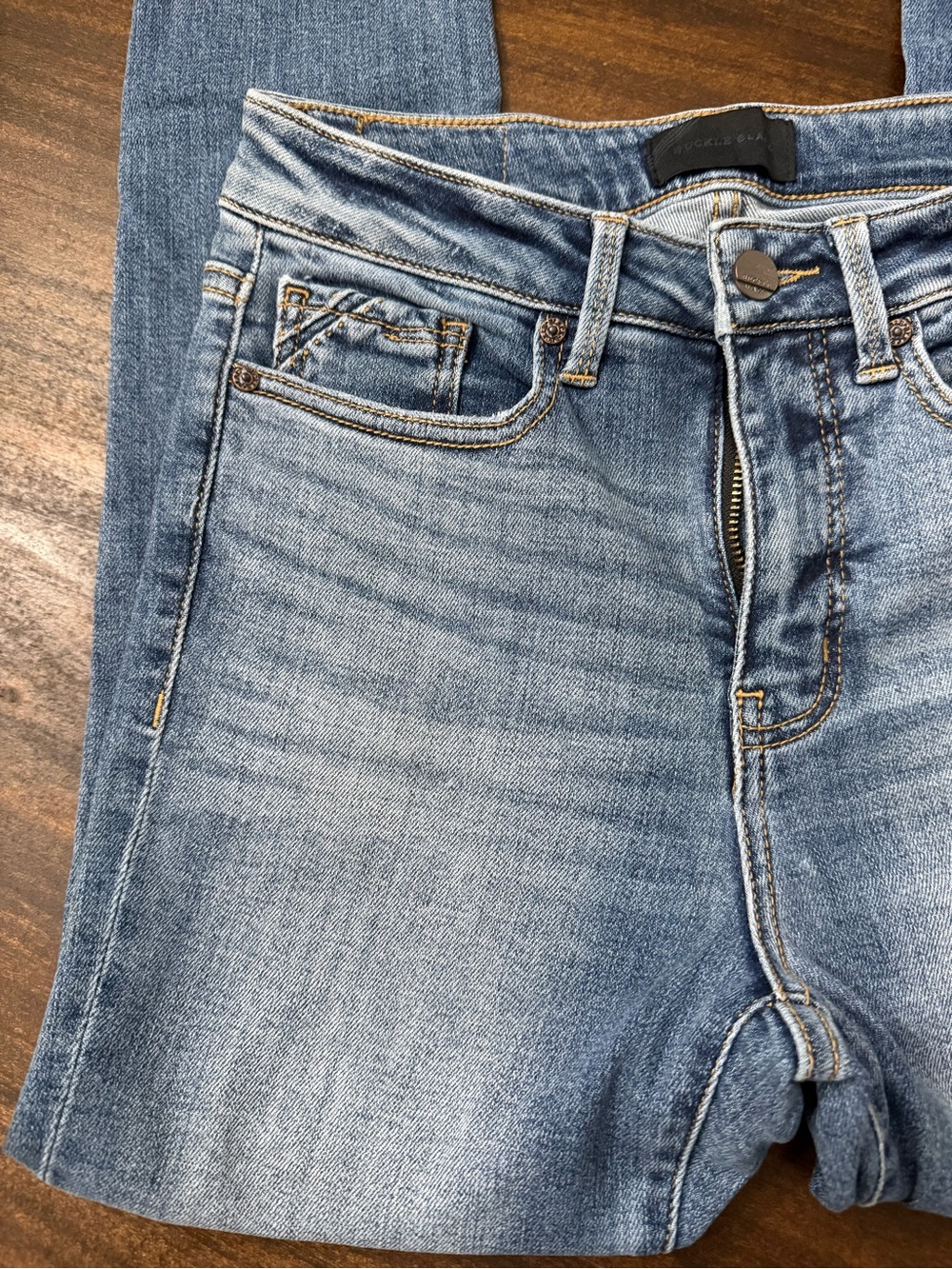 Buckle Faded Blue Skinny Jeans with Raw Hem - Picture 4 of 9